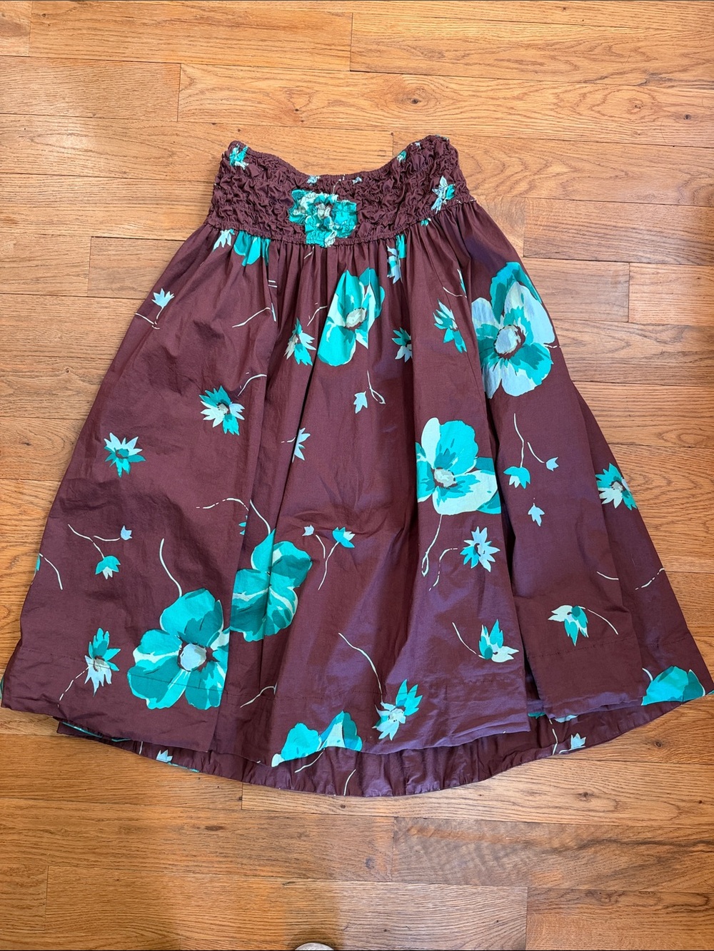 Free people carino printed Floral Smocked Skirt in brown withTeal Flowers